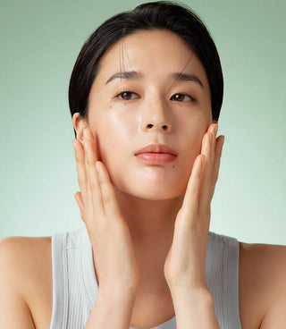 Close-up of calm, evenly toned skin in soft daylight, illustrating Skin-Nomad's guide to laser aftercare